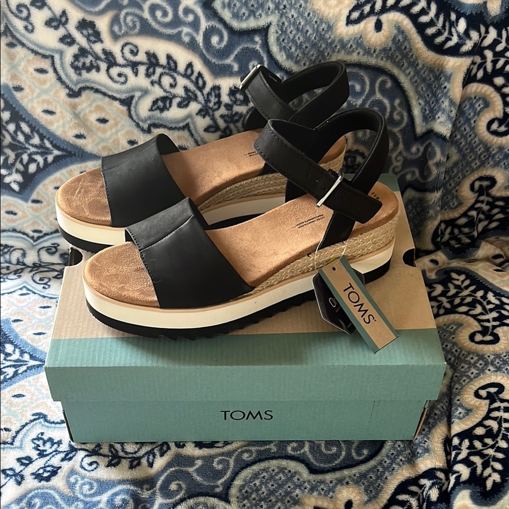 TOMS Black Sandals with Classic Slip-On Design